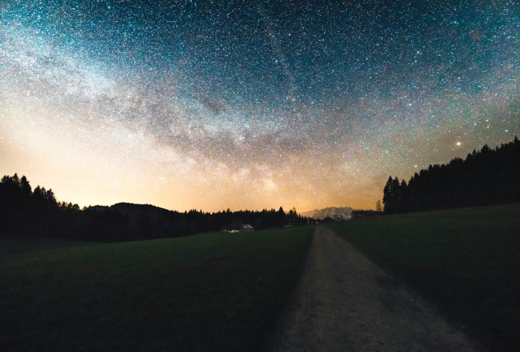 gray road under night sky